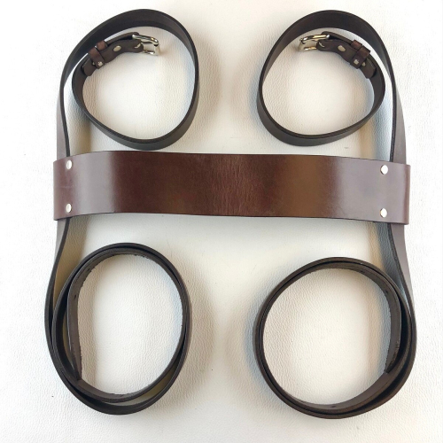 Brown leather luggage straps with crossover