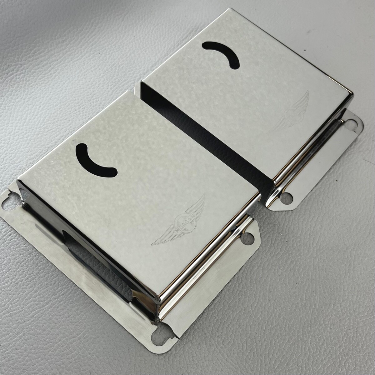 Door lock covers in stainless steel with new style Morgan wings logo