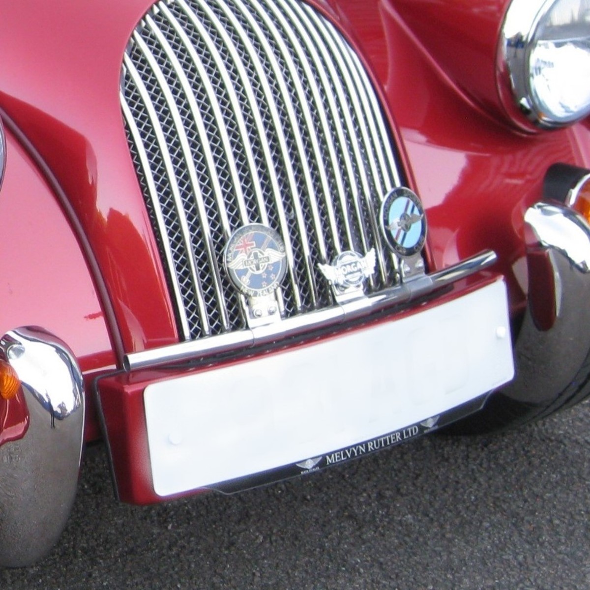 Stainless steel badge bar for cars with overriders and no bumper - tubular....