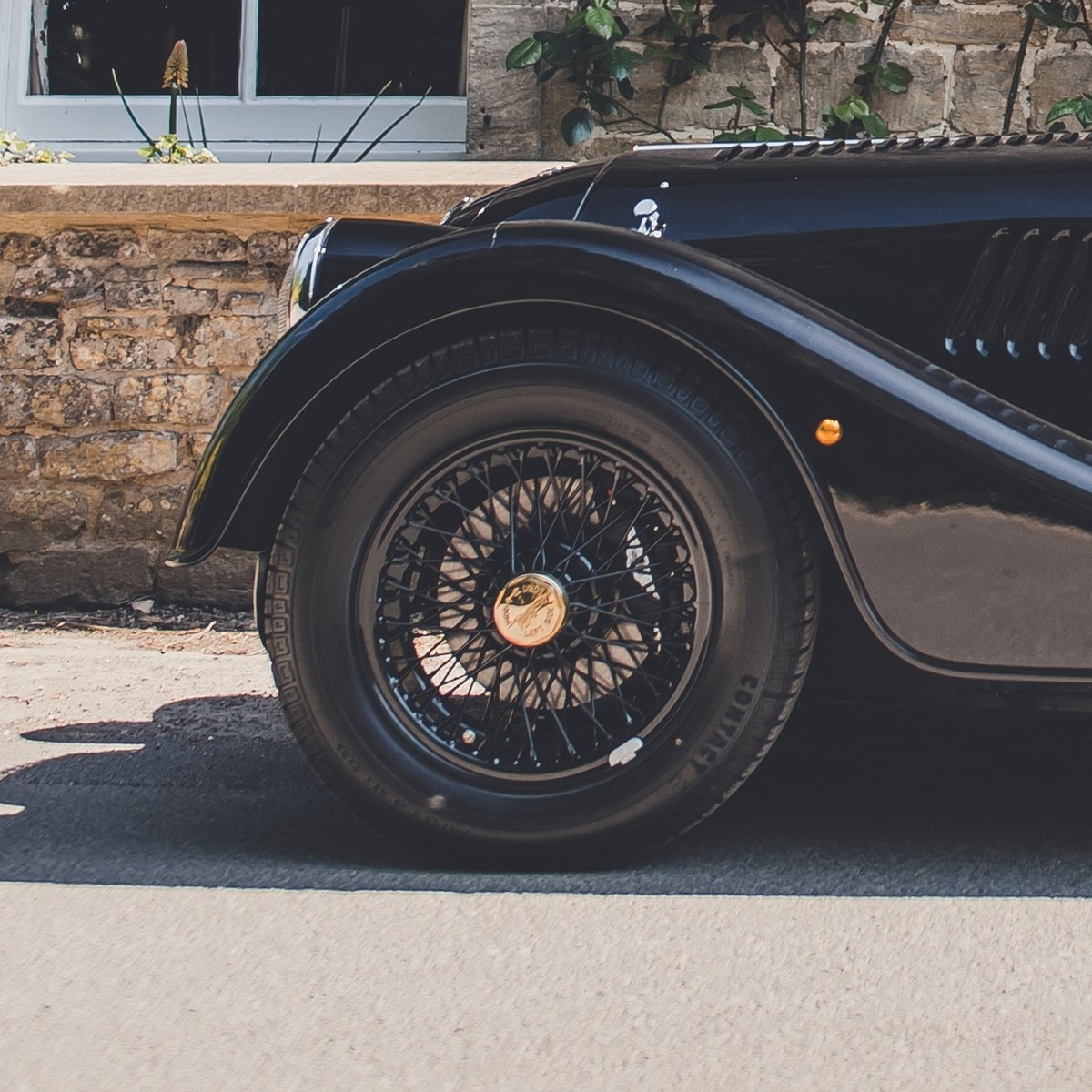 Polished brass continental hub nut right - engraved 'Morgan'