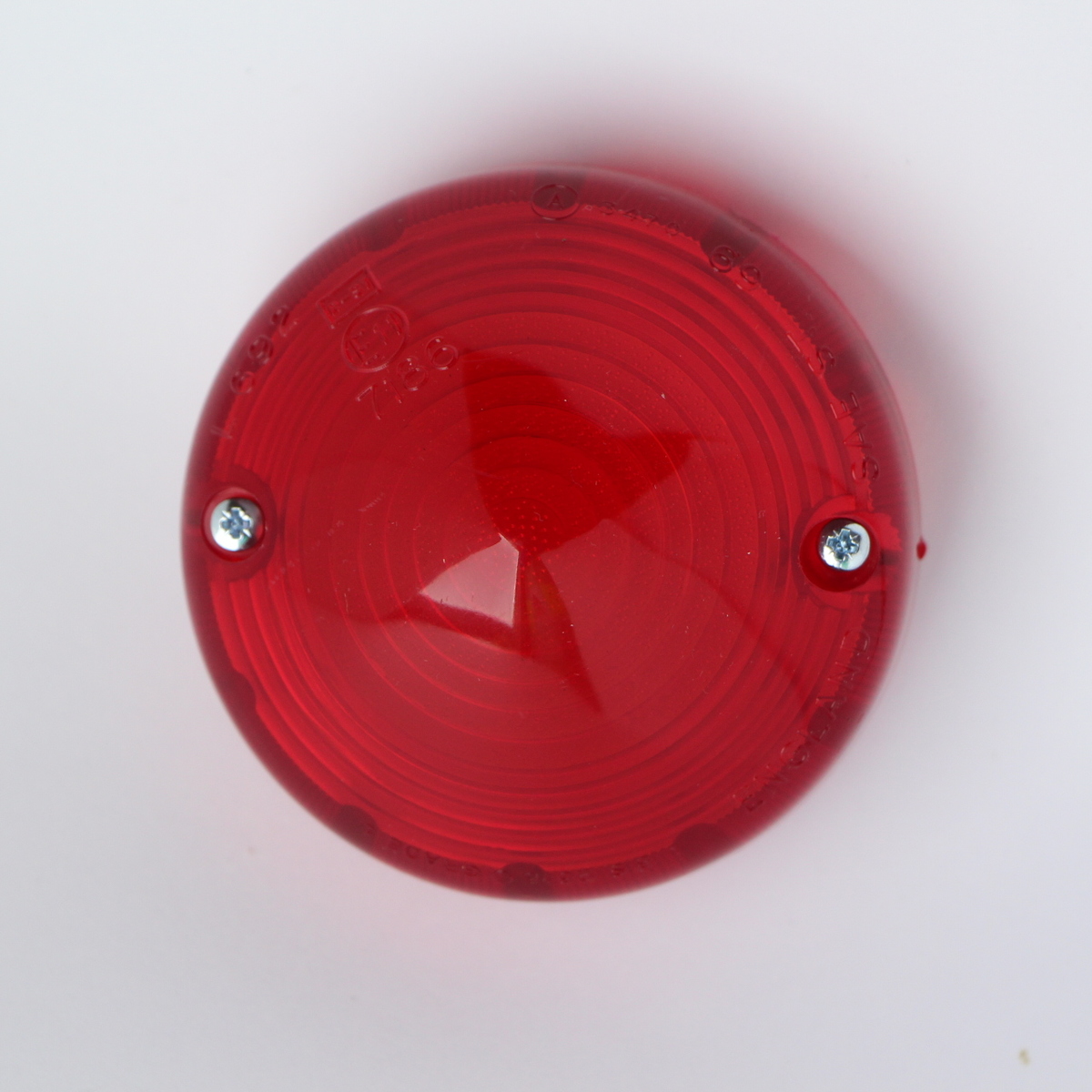 Stop/tail lens for ELA501