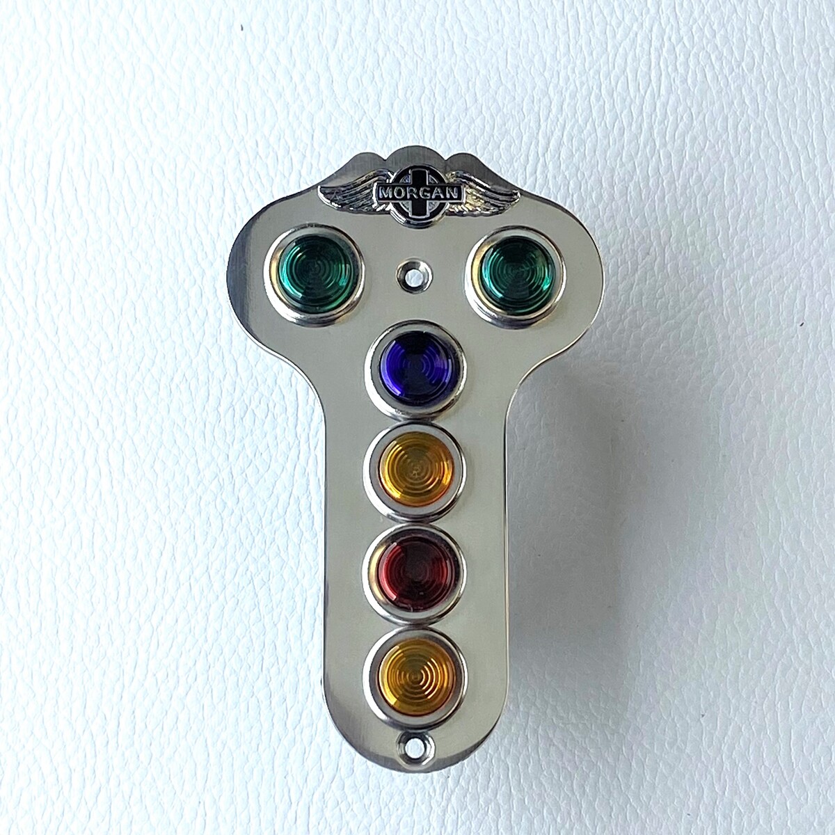 Polished stainless steel warning light plate 1991-3/95 with Morgan wings...