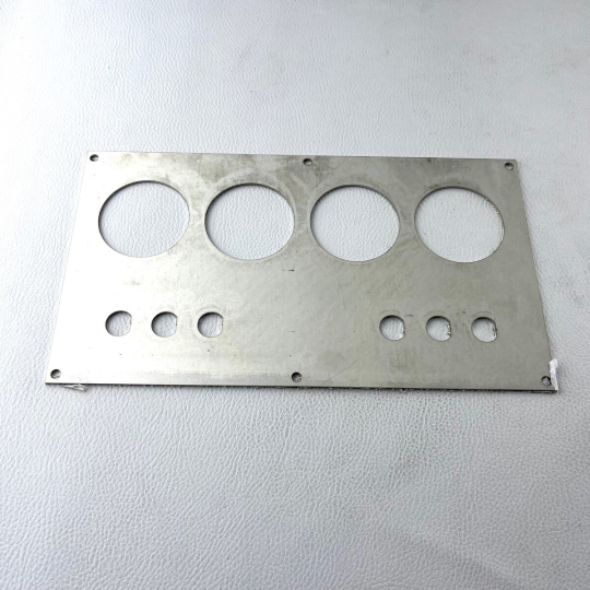 Switch panel 1976-6/97 in polished stainless steel with hole for clock (for...