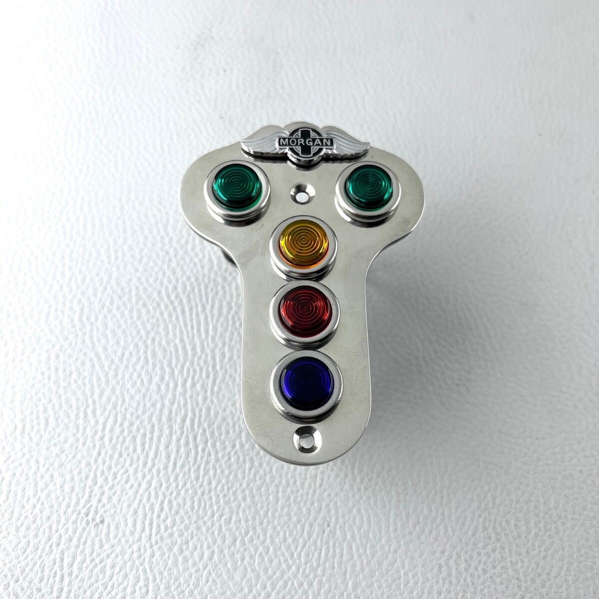 Polished stainless steel warning light plate 1986-91 with Morgan wings badge...