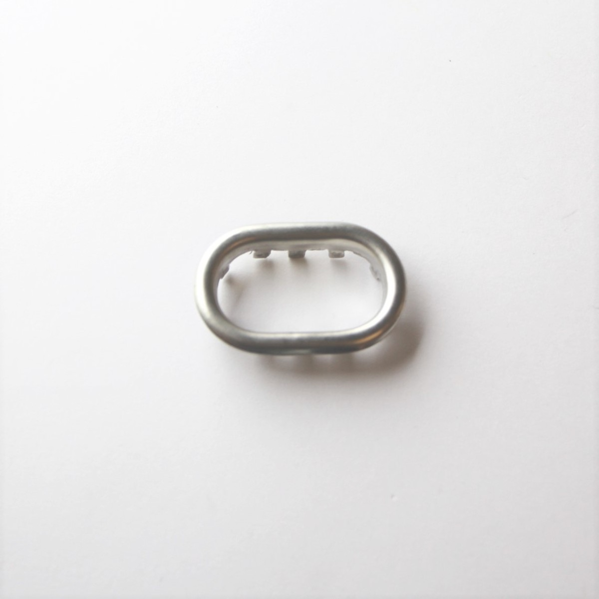 Stainless steel trim for top of seat where headrest fits (single prong)