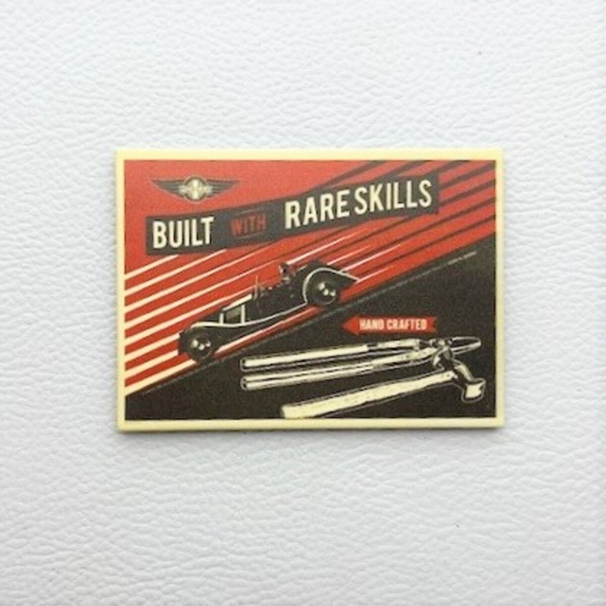Morgan fridge magnet red 'Built with Rare Skills'