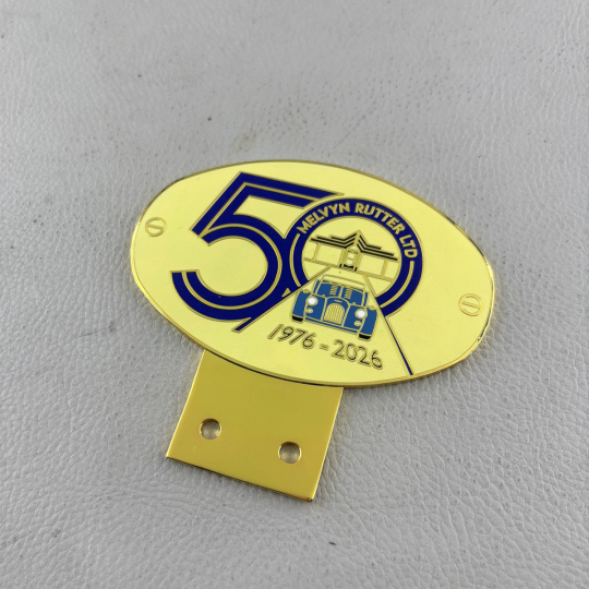 50 year enamel car badge